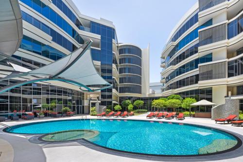 Πισίνα στο ή κοντά στο Majestic Arjaan by Rotana – Manama