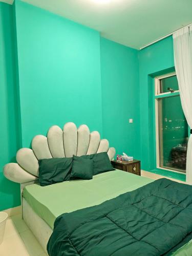 Llit o llits en una habitació de Abu Dhabi Castel