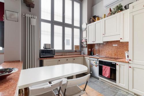 GuestHost - MM2 Sant'Agostino Apartment Milano