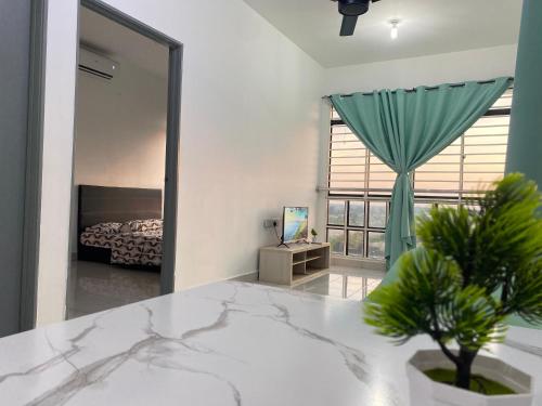 Ένα ή περισσότερα κρεβάτια σε δωμάτιο στο Ai Lee Homestay