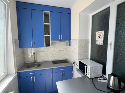 Kuchyň nebo kuchyňský kout v ubytování Guest House MAX