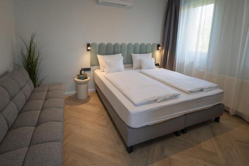 Postel nebo postele na pokoji v ubytování Boutique Villa Vanilla