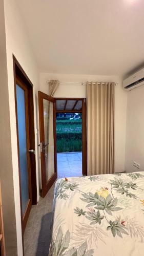 Katil atau katil-katil dalam bilik di Rumah Kemuning Bali