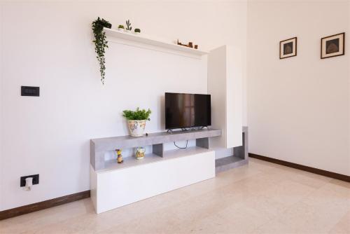 TV a/nebo společenská místnost v ubytování IseoLakeRental - Casa Pluto