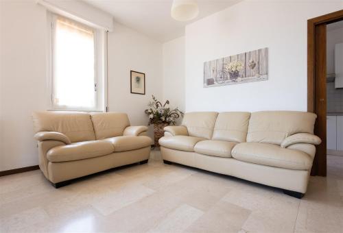 Posezení v ubytování IseoLakeRental - Casa Pluto