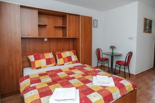 Katil atau katil-katil dalam bilik di Apartments BRANO
