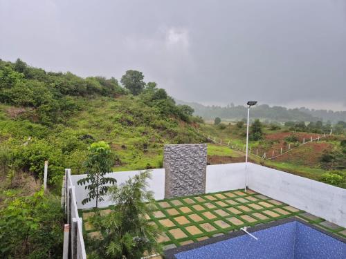 a view from the roof of a house at Rolling Hills in Trimbak