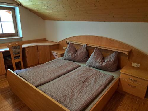 Ένα ή περισσότερα κρεβάτια σε δωμάτιο στο Appartements Bacher Hof