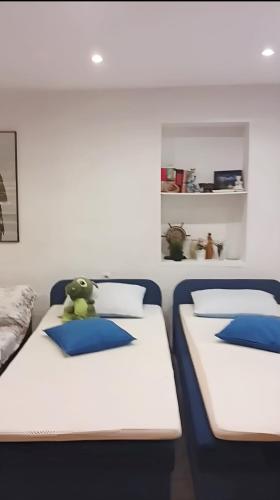 Katil atau katil-katil dalam bilik di Yasmin Breeze Apartment