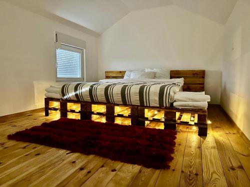 Postel nebo postele na pokoji v ubytování Tiny house 2 - Imanje Terzic