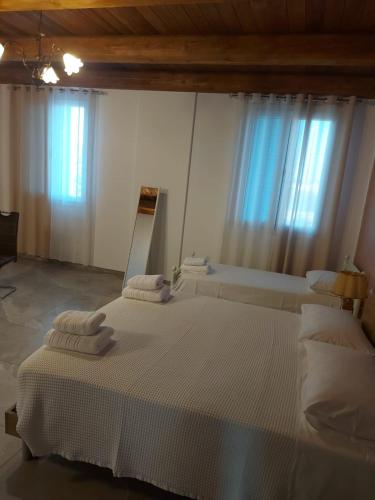 Katil atau katil-katil dalam bilik di Bed and Breakfast Aida
