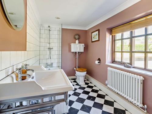 a bathroom with a sink and a toilet at 7 Bed in Waterhouses 81529 in Waterhouses