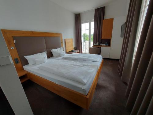 Postel nebo postele na pokoji v ubytování Hotel Seehof