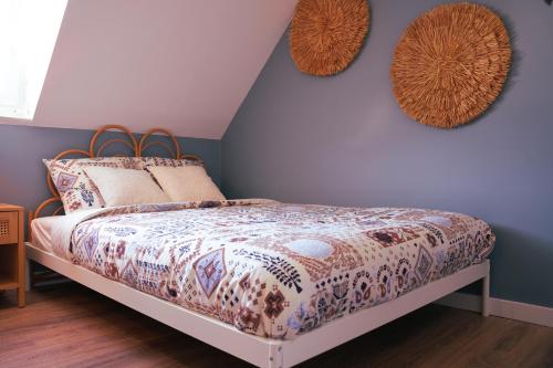 Postel nebo postele na pokoji v ubytování La Parenthèse Savane