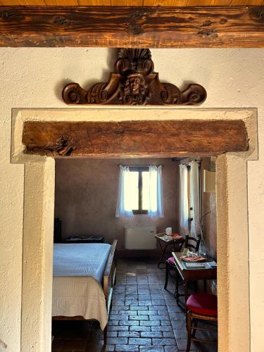 Letto o letti in una camera di Foresteria Di Villa Tiepolo Passi