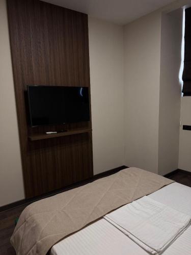 TV a/nebo společenská místnost v ubytování Prime Hotel