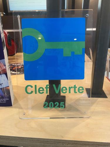 a sign in a display case in a store at Novotel Le Mans in Le Mans