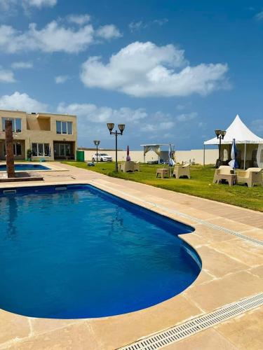 Бассейн в Wadi Banour Resort или поблизости