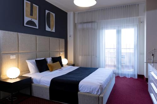 Postel nebo postele na pokoji v ubytování Orhideea Residence & Spa