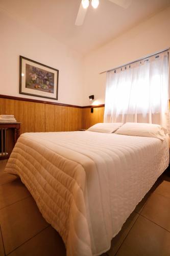 Postel nebo postele na pokoji v ubytování Cordoba Yolanda Hotel