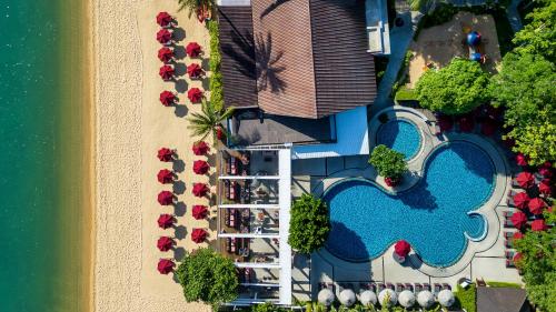 an overhead view of a resort with a swimming pool at NH Collection Samui Peace Resort in Bophut