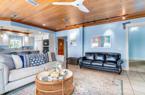 a living room with a couch and a table at Sunrise Shores in Carrabelle