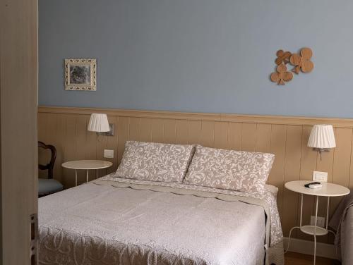 Ένα ή περισσότερα κρεβάτια σε δωμάτιο στο Cà Nostra B&B Home Restaurant