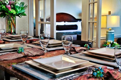 a table with plates and glasses on top of a room at Crowne Plaza Hotel Portland-Downtown Convention Center by IHG in Portland