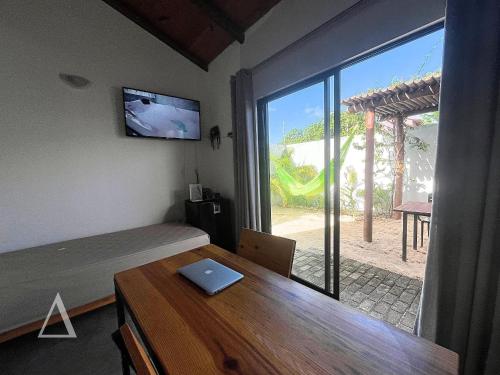 Televisyen dan/atau pusat hiburan di Quattuor Cabanas. Privacidade e conforto com hidromassagem
