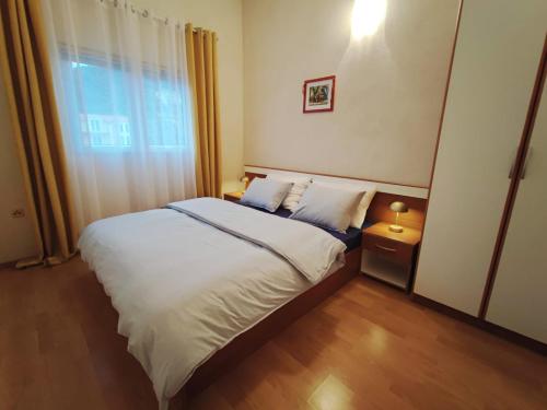 Katil atau katil-katil dalam bilik di Astramaris Apartments