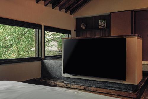 Televisyen dan/atau pusat hiburan di Futon Designer Hotel-Liberation Monument&Nanbin Road Store