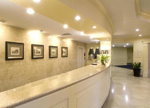 a lobby with a long counter in a building at Crowne Plaza Hotel Portland-Downtown Convention Center by IHG in Portland