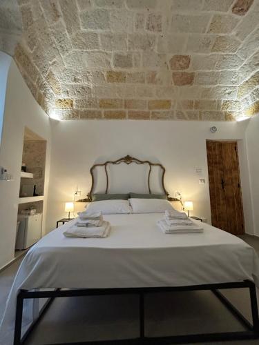 Postel nebo postele na pokoji v ubytování MIRA - casa di mare