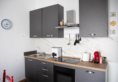 Kuchyň nebo kuchyňský kout v ubytování Gentile's home