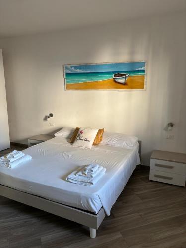Postel nebo postele na pokoji v ubytování B&B Casa di Nonna Checca