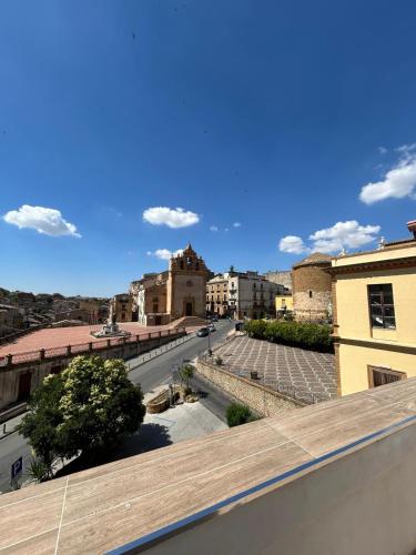 a view of a city from the roof of a building at La Casa di Joao in Piazza Armerina