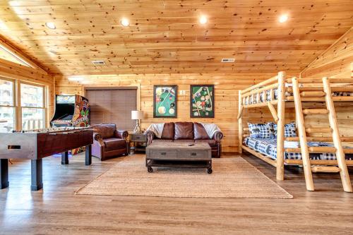 Giường trong phòng chung tại Gatlinburg Cabin with Private Hot Tub by Staycating