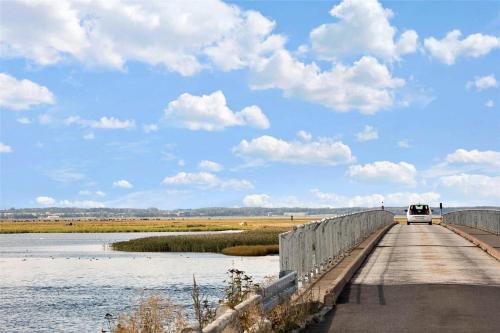 a car on a bridge over a body of water at 2007-Stege-Aedelgranen-3 in Stege