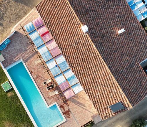 an overhead view of a building with a swimming pool at Monte Costa Raiz in Mértola