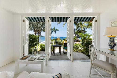 a living room with a view of the ocean at Round Hill Hotel & Villas in Montego Bay