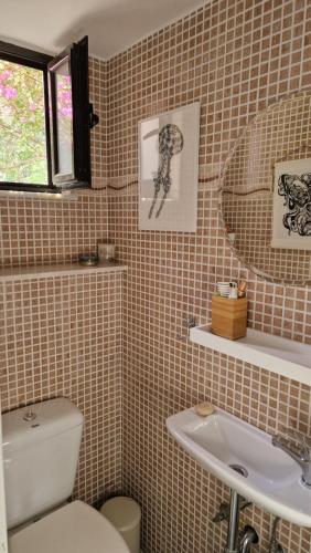 Koupelna v ubytování Maison Pera Melana, entre mer et montagne