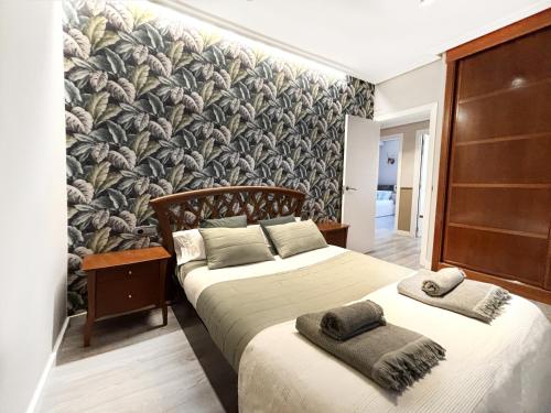 En eller flere senge i et værelse på Luxury San Prudencio Vitoria