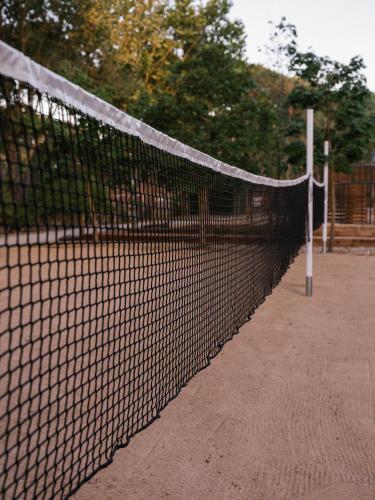 a tennis net on a tennis court at wecamp Santa Cristina in Santa Cristina d'Aro