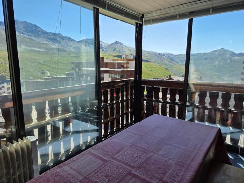 a balcony with a view of the mountains at Le Serac Panoramic Mountain View spacious 40m2 managed by private host in Val Thorens