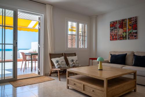 Χώρος καθιστικού στο AT148 Frente la playa, jardín privado, vistas mar