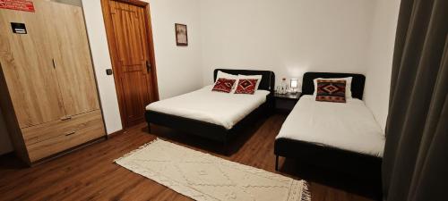 Кровать или кровати в номере Guest House Da Mata