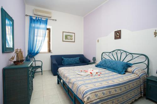 Postel nebo postele na pokoji v ubytování Appartamenti a Lipari