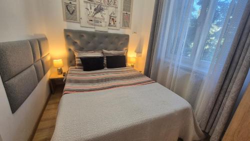 Giường trong phòng chung tại Park Residence