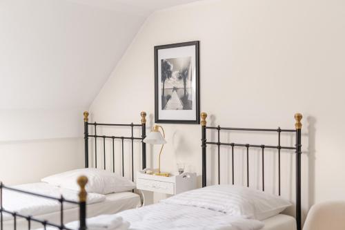 Ένα ή περισσότερα κρεβάτια σε δωμάτιο στο Dom w Grzybowie Kołobrzeg