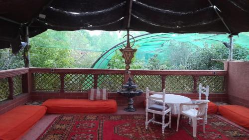 Ein Balkon oder eine Terrasse in der Unterkunft Ecogite La Tourterelle - B&B